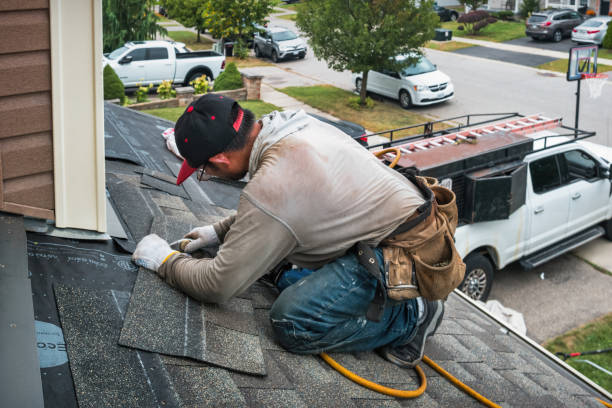 Professional Roofing technician working in Charlottesville, IN